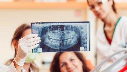 Dentist,And,Female,Patient,Looking,To,X-ray